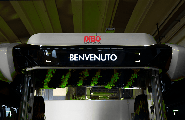 Benvenuto: Pictured in Italian on his LED wall, the roll over welcomes his car wash customers. 